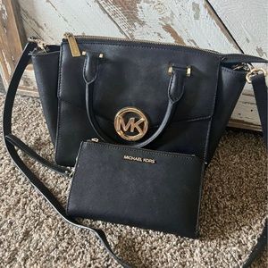 Michael Kors purse and wallet, excellent condition and barely used.